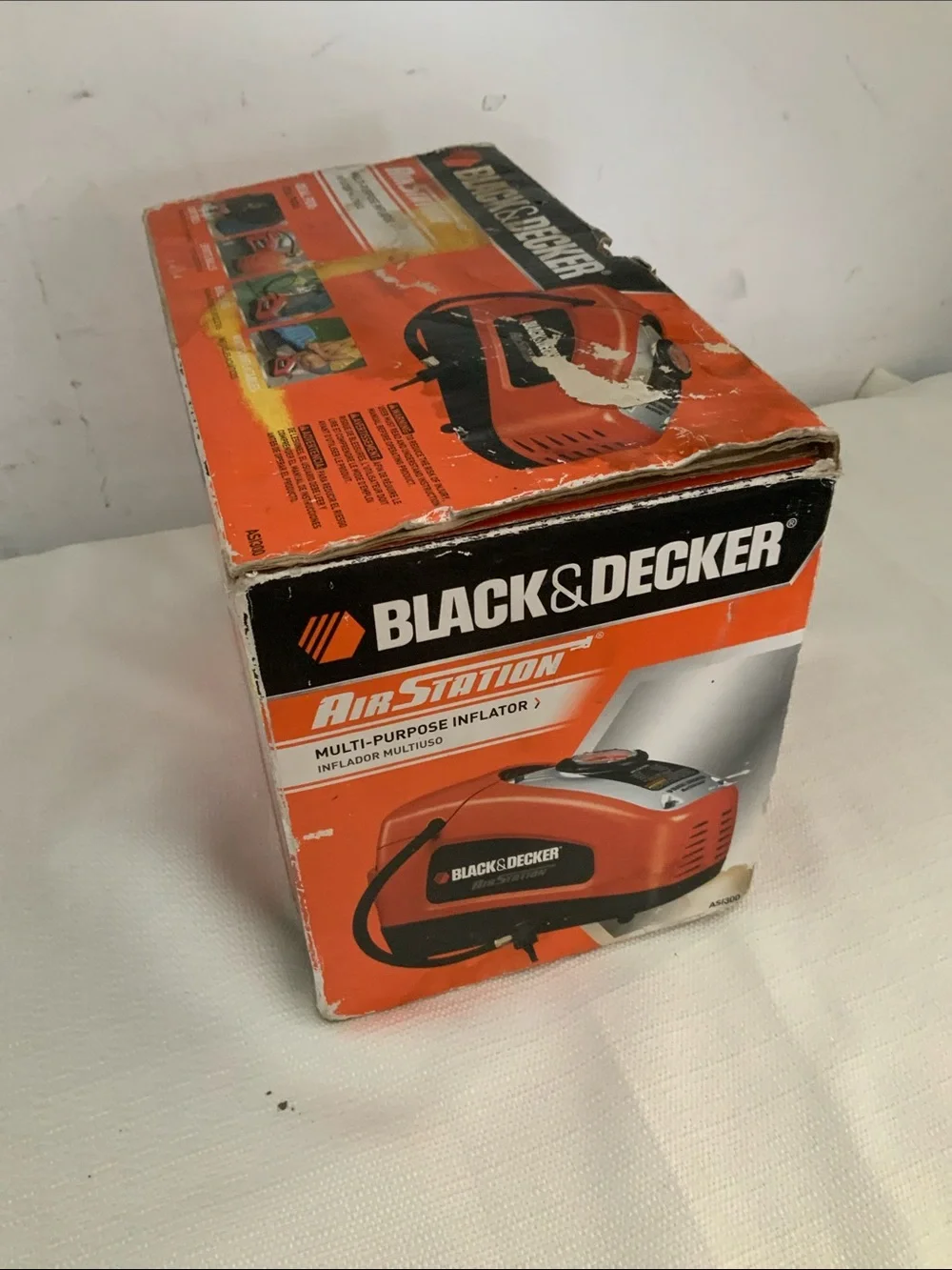 Black & Decker tire inflator. Manual included.